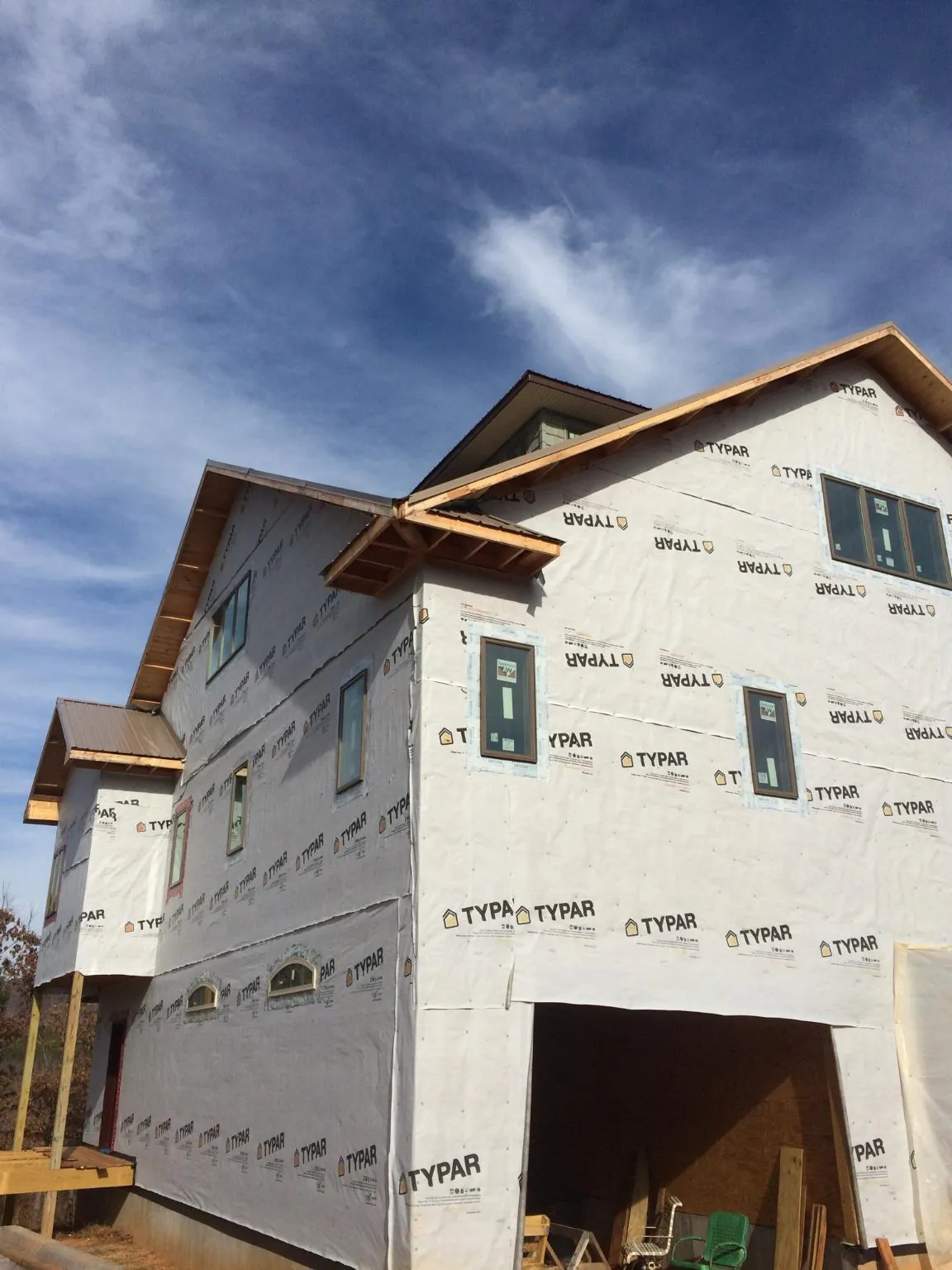 Stick built house wrapped in Typar with new roof framing and dormers in Salisbury